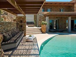 Kounoupas Complex by Mykonos Rocks