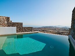 Kounoupas Complex by Mykonos Rocks