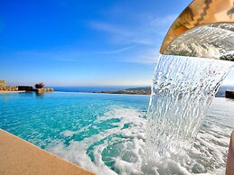 Kounoupas Complex by Mykonos Rocks