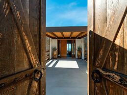 Kounoupas Complex by Mykonos Rocks