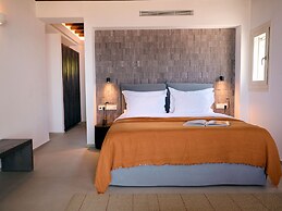 Kounoupas Complex by Mykonos Rocks