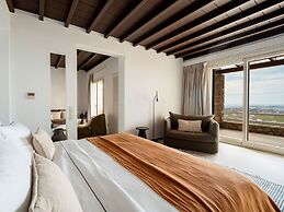 Kounoupas Complex by Mykonos Rocks