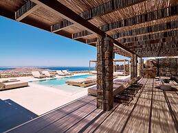 Kounoupas Complex by Mykonos Rocks