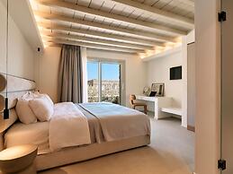 Kounoupas Complex by Mykonos Rocks