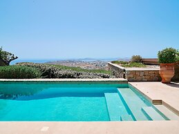 Kounoupas Complex by Mykonos Rocks