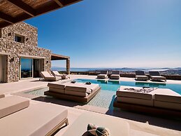 Kounoupas Complex by Mykonos Rocks