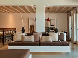 Kounoupas Complex by Mykonos Rocks