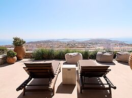 Kounoupas Complex by Mykonos Rocks