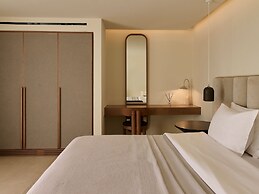 Kounoupas Complex by Mykonos Rocks