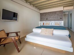 Kounoupas Complex by Mykonos Rocks