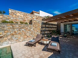 Kounoupas Complex by Mykonos Rocks