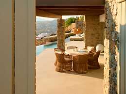 Kounoupas Complex by Mykonos Rocks