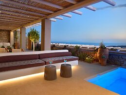 Kounoupas Complex by Mykonos Rocks