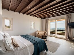 Kounoupas Complex by Mykonos Rocks