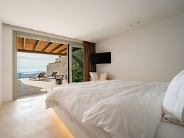 Kounoupas Complex by Mykonos Rocks