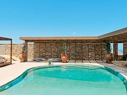 Kounoupas Complex by Mykonos Rocks