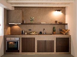 Kounoupas Complex by Mykonos Rocks