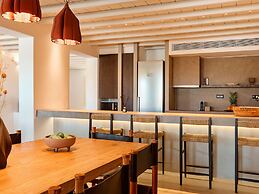 Kounoupas Complex by Mykonos Rocks