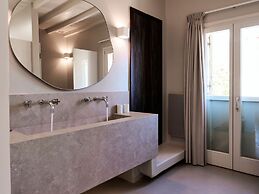 Kounoupas Complex by Mykonos Rocks