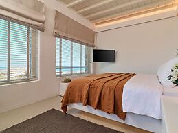 Kounoupas Complex by Mykonos Rocks