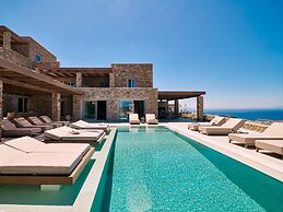 Kounoupas Complex by Mykonos Rocks