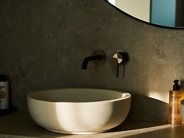 Kounoupas Complex by Mykonos Rocks