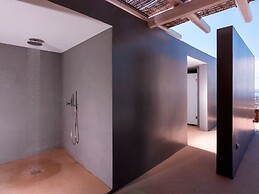 Kounoupas Complex by Mykonos Rocks