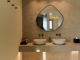 Kounoupas Complex by Mykonos Rocks