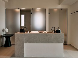 Kounoupas Complex by Mykonos Rocks