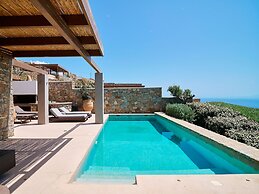 Kounoupas Complex by Mykonos Rocks