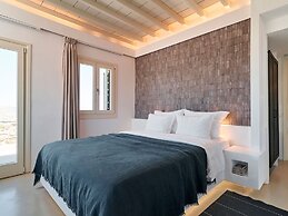 Kounoupas Complex by Mykonos Rocks