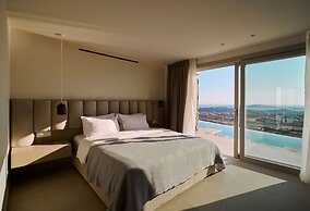 Kounoupas Complex by Mykonos Rocks