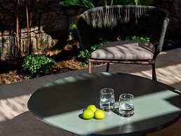 Kounoupas Complex by Mykonos Rocks