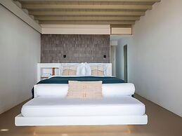 Kounoupas Complex by Mykonos Rocks