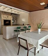 Casa com piscina 5 suites 1 quarto e AC