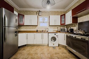 Distinct & Decent 2 BDR Apt. Steps From Nightlife and Airport