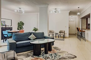 Distinct & Decent 2 BDR Apt. Steps From Nightlife and Airport