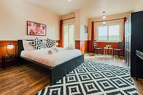 Distinct & Decent 2 BDR Apt. Steps From Nightlife and Airport