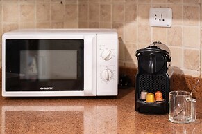 Distinct & Decent 2 BDR Apt. Steps From Nightlife and Airport