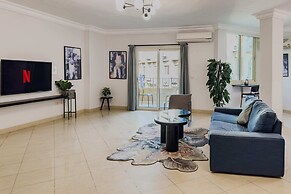 Distinct & Decent 2 BDR Apt. Steps From Nightlife and Airport