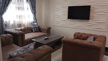 ADJ ROYALTY HOTELS & SUITES LTD
