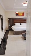 ADJ ROYALTY HOTELS & SUITES LTD
