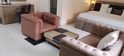 ADJ ROYALTY HOTELS & SUITES LTD