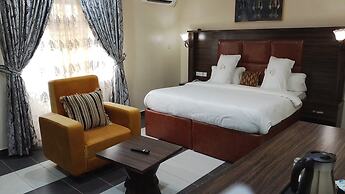 ADJ ROYALTY HOTELS & SUITES LTD