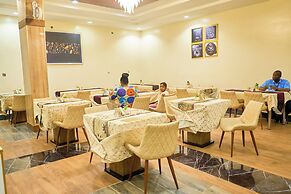 ADJ ROYALTY HOTELS & SUITES LTD