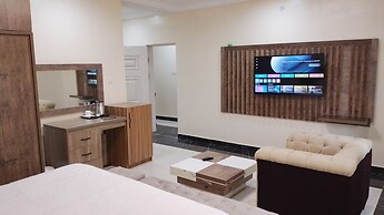 ADJ ROYALTY HOTELS & SUITES LTD