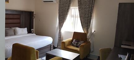ADJ ROYALTY HOTELS & SUITES LTD