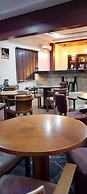 ADJ ROYALTY HOTELS & SUITES LTD