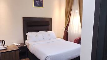 ADJ ROYALTY HOTELS & SUITES LTD
