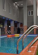 ADJ ROYALTY HOTELS & SUITES LTD